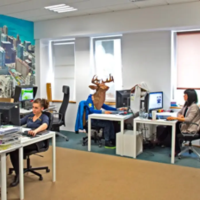 photo: Designers at work. On the office walls - Bimago wallpapers :)